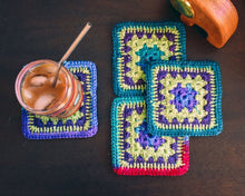 Load image into Gallery viewer, Vibrant Multicolor Crochet Coasters Set (Set of 4)