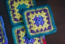 Load image into Gallery viewer, Vibrant Multicolor Crochet Coasters Set (Set of 4)