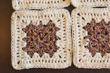 Load image into Gallery viewer, Rich Purple & Cream Granny Square Crochet Coasters Set (Set of 4)